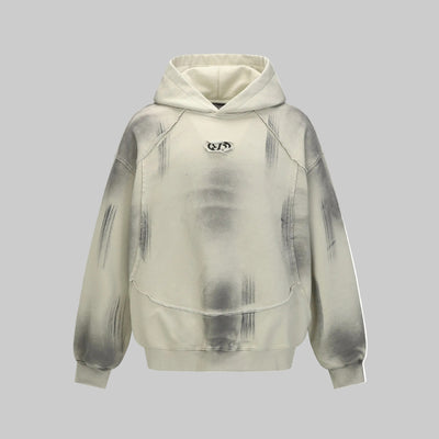 Hairy edge washed and spray dyed hoodie