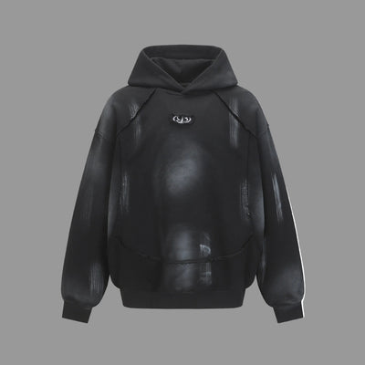 Hairy edge washed and spray dyed hoodie