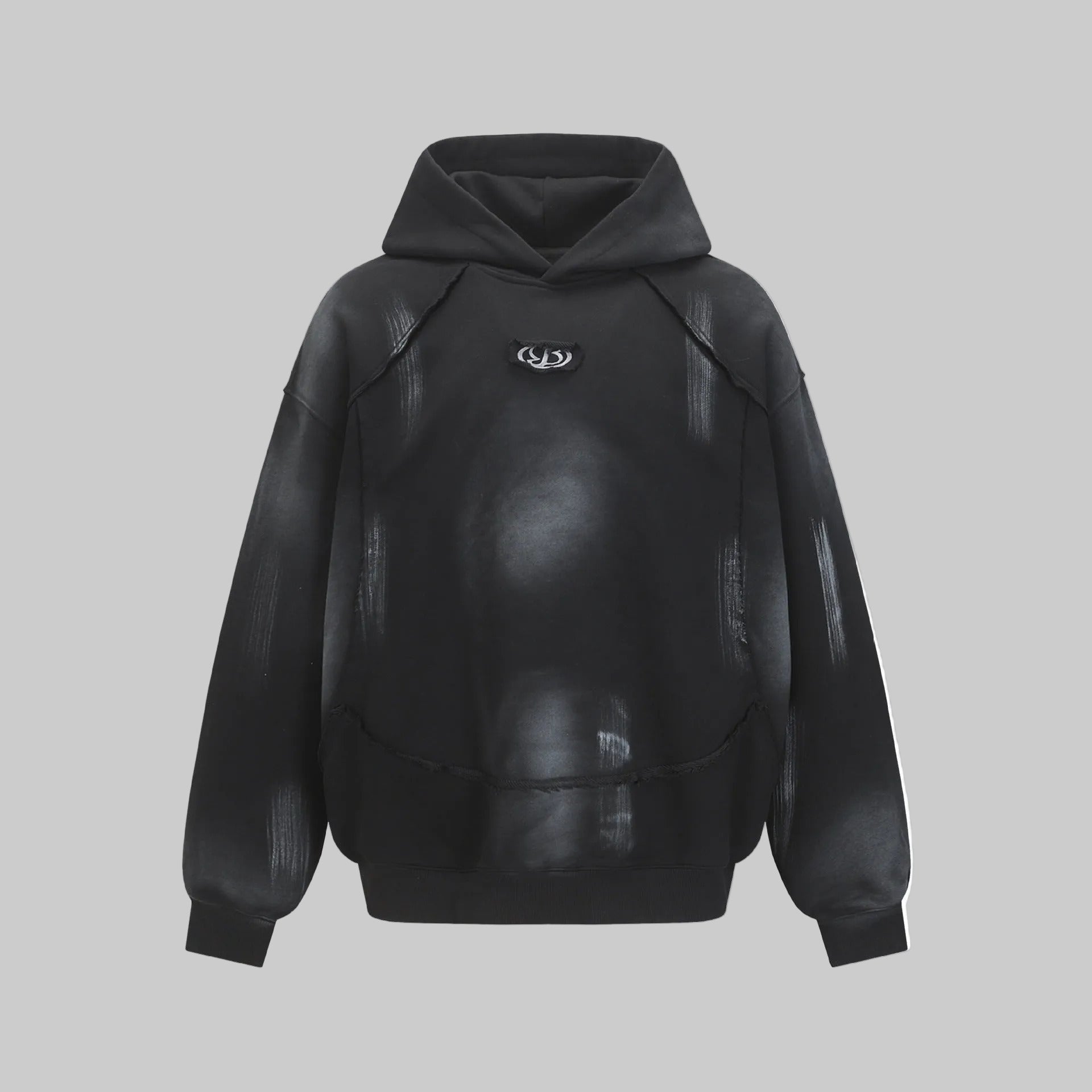 Hairy edge washed and spray dyed hoodie